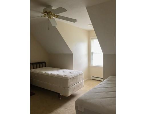 75 Ridge Road Raynham, MA 02767 - Photo 18 of 28 a bedroom with a bed and a window