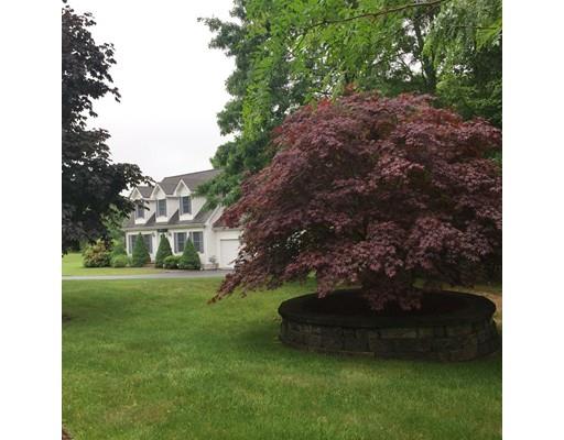 75 Ridge Road Raynham, MA 02767 - Photo 24 of 28 a view of a field of grass and trees