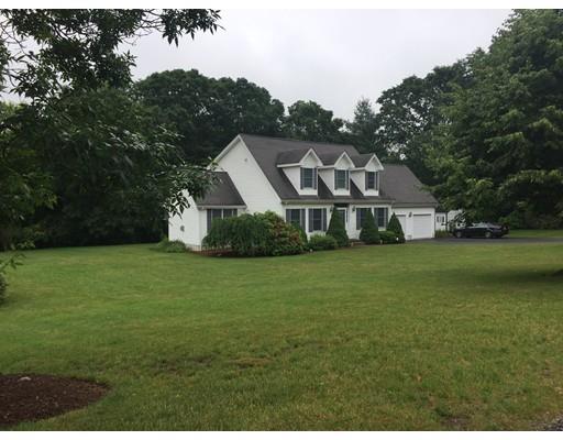 75 Ridge Road Raynham, MA 02767 - Photo 26 of 28 a front view of a house with a garden