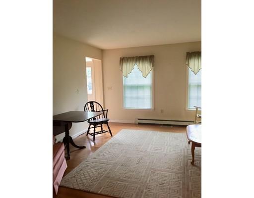 75 Ridge Road Raynham, MA 02767 - Photo 10 of 28 a bedroom with a bed and a window