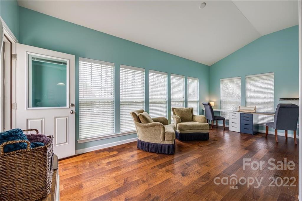 612 Panthers Way Fort Mill, SC 29708 - Photo 14 of 31 a living room with furniture and large windows