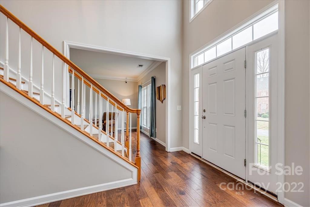 612 Panthers Way Fort Mill, SC 29708 - Photo 2 of 31 a view of an entryway with wooden floor