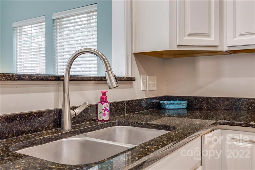612 Panthers Way Fort Mill, SC 29708 - Photo 10 of 31 a kitchen with a sink and a window