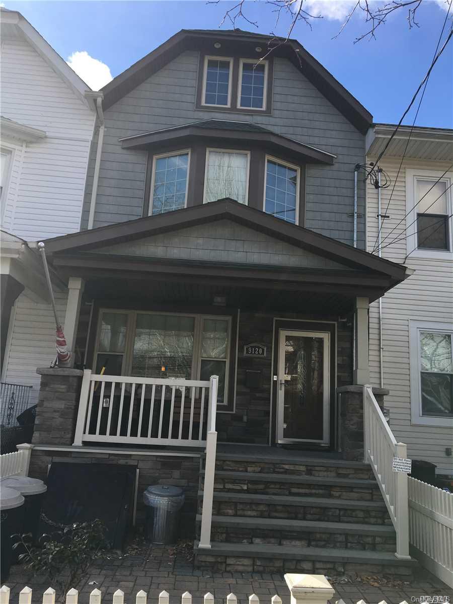 91-20 96th Street Queens, NY 11421 - Photo 1 of 1 a front view of a house