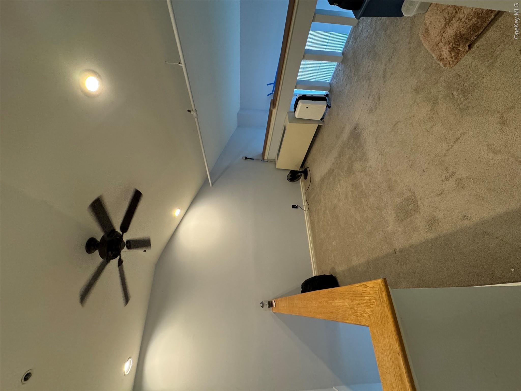 1701 Crompond Road, Unit 6313 Peekskill, NY 10566 - Photo 6 of 13 a view of a livingroom with a ceiling fan