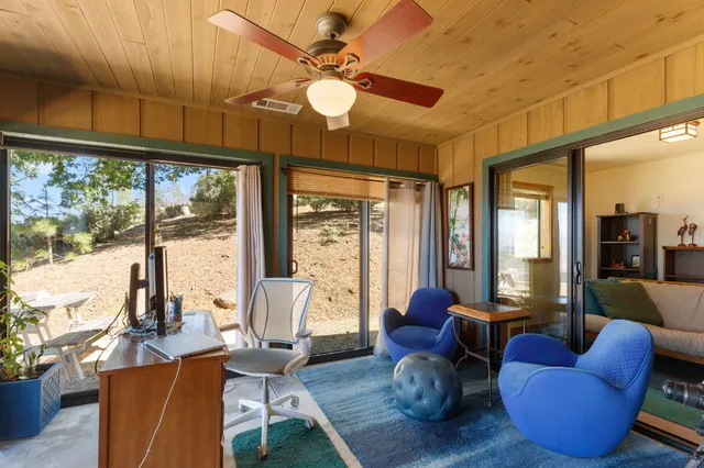 a spacious bathroom with a granite countertop double vanity sink mirror and