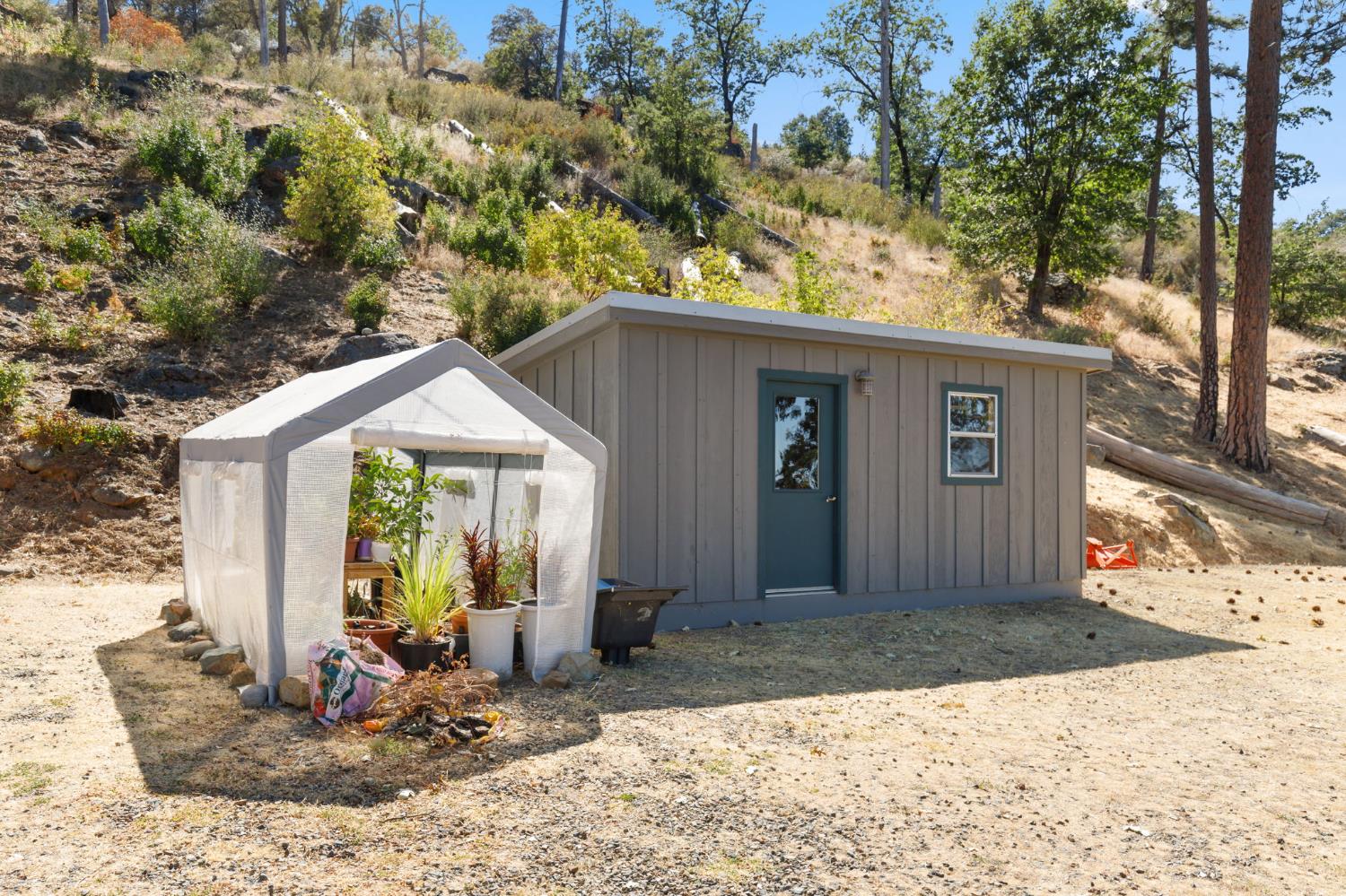 5851 Mt Bullion Ridge Road Mariposa, CA 95338 - Photo 48 of 83 a front view of a house with garden