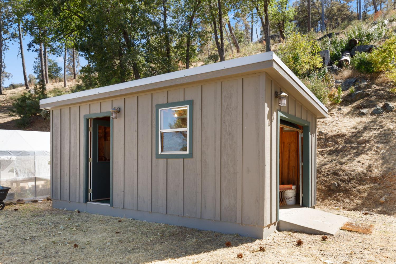 5851 Mt Bullion Ridge Road Mariposa, CA 95338 - Photo 50 of 83 a view of a house with a backyard