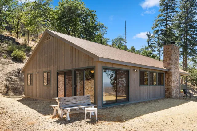 a kitchen with stainless steel appliances granite countertop a stove and cabinets