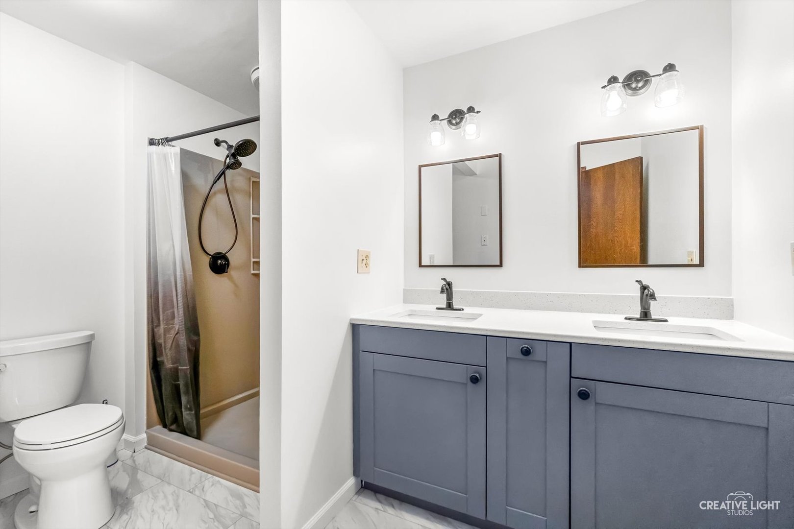 1483 Nova Road Sandwich, IL 60548 - Photo 10 of 29 a bathroom with a toilet sink shower and mirror