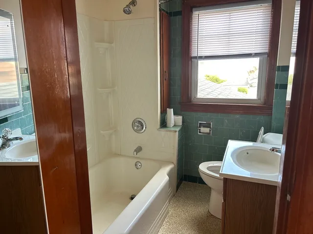 a bathroom with a sink and a bathtub