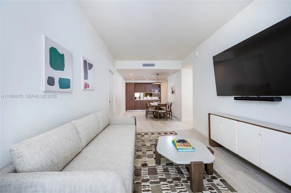 a view of living room washer and dryer