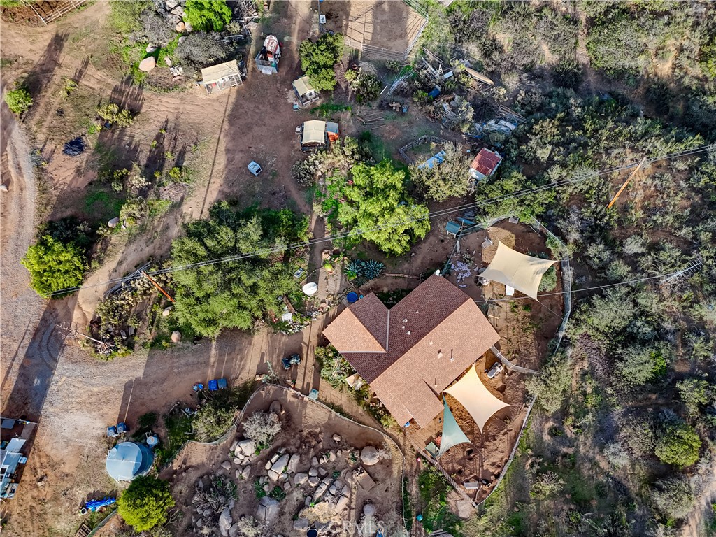 1473 Arnoldo Road Dulzura, CA 91917 - Photo 11 of 19 an aerial view of a house with a yard and garden