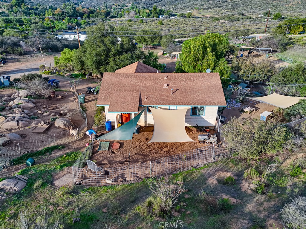 1473 Arnoldo Road Dulzura, CA 91917 - Photo 3 of 19 a aerial view of a house with yard and outdoor seating