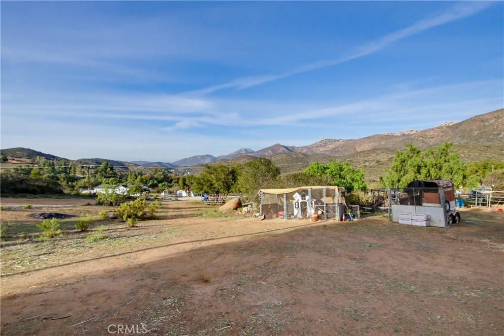 1473 Arnoldo Road Dulzura, CA 91917 - Photo 10 of 19 a view of a lake with mountain view