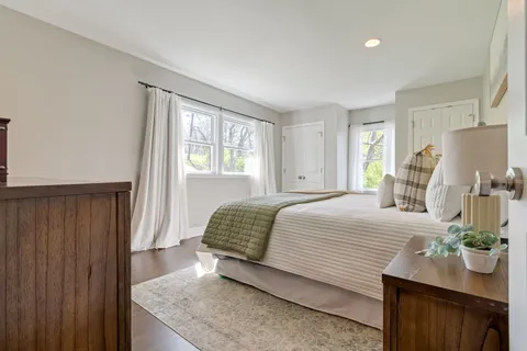 an aerial view of a house with a yard