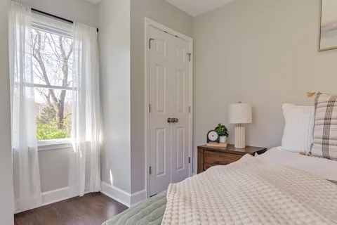 a aerial view of a house with a yard