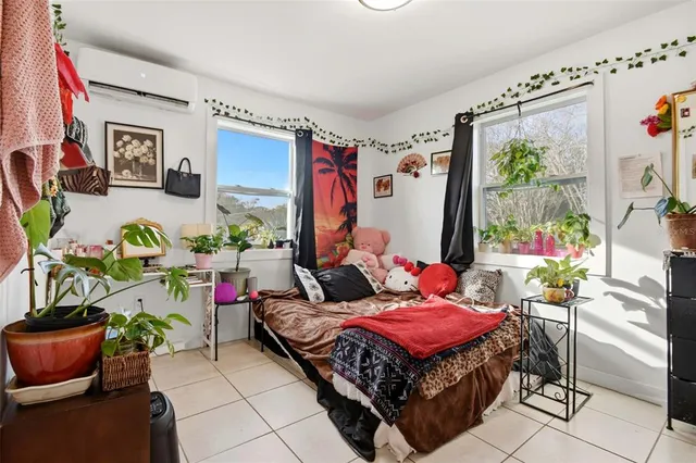 a living room filled with furniture and a couch