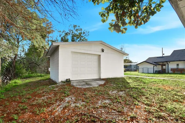 a house with trees in the background