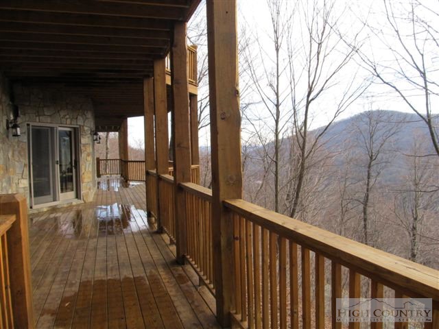 495 Mulberry Mountain Road Boone, NC 28607 - Photo 19 of 36 a view of a balcony with wooden floor