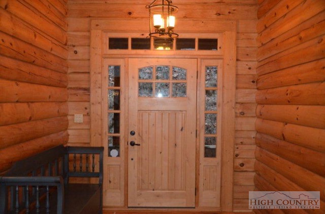 495 Mulberry Mountain Road Boone, NC 28607 - Photo 2 of 36 a view of a brick house with a small space