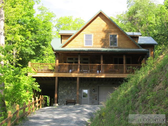 495 Mulberry Mountain Road Boone, NC 28607 - Photo 27 of 36 a view of a house with a yard