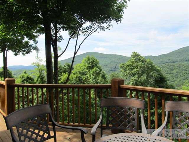 495 Mulberry Mountain Road Boone, NC 28607 - Photo 29 of 36 a view of a balcony with wooden floor and fence