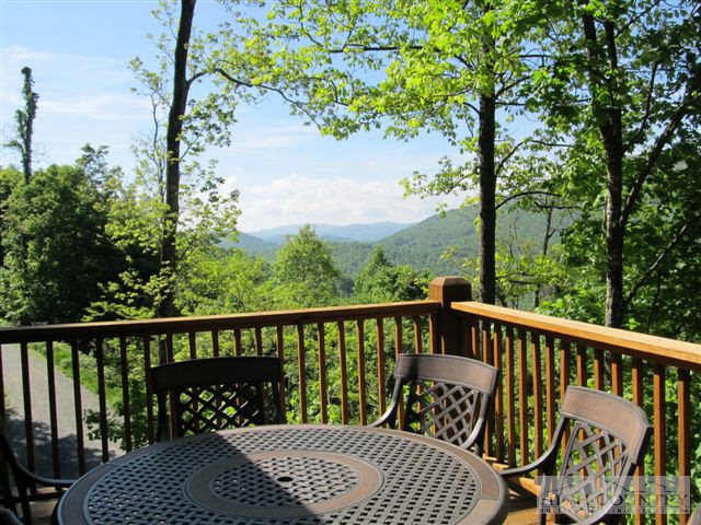 495 Mulberry Mountain Road Boone, NC 28607 - Photo 3 of 36 a view of a balcony with wooden floor