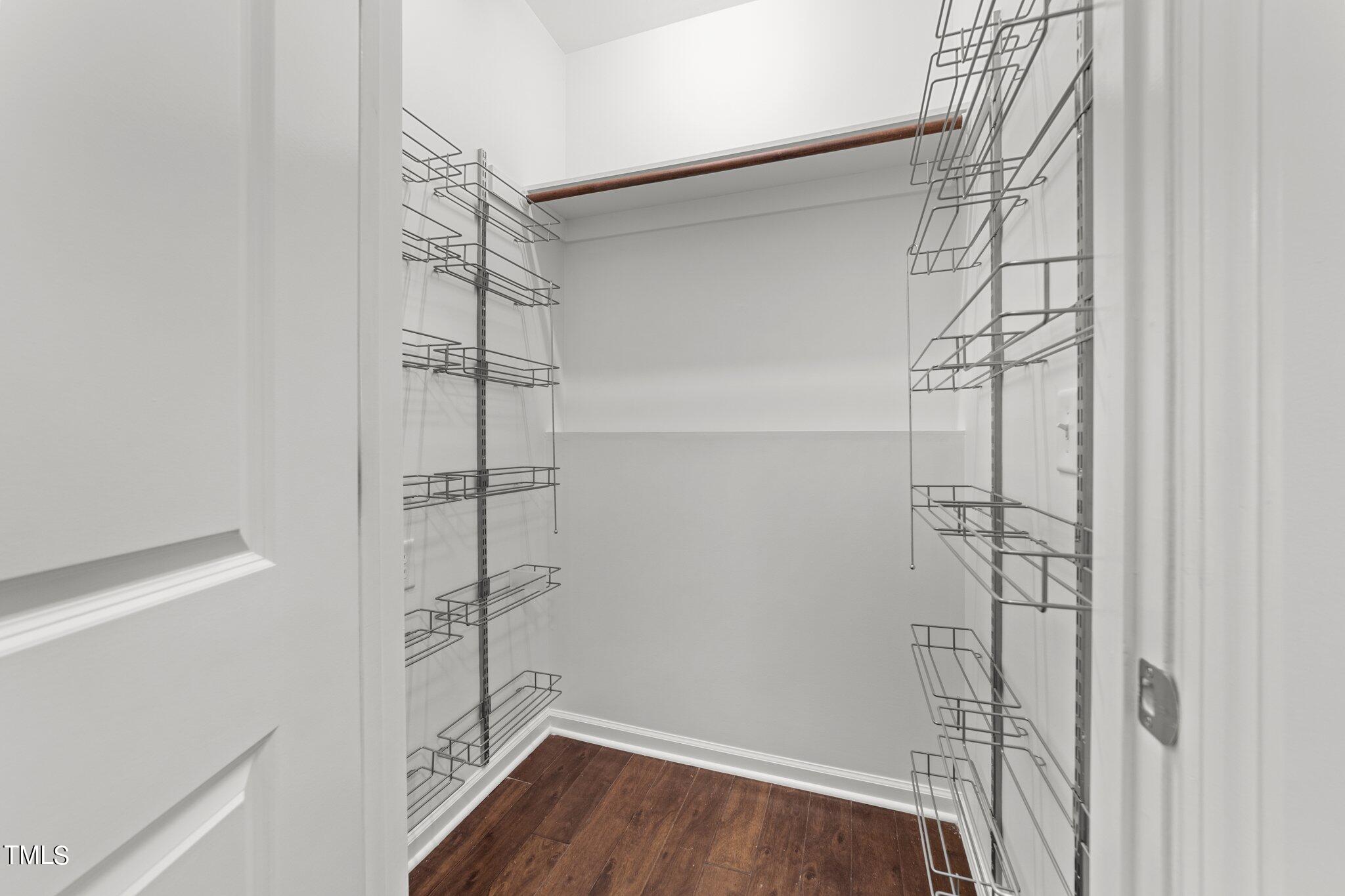 5627 Wade Park Boulevard Raleigh, NC 27607 - Photo 19 of 44 a view of a room with racks on the wall