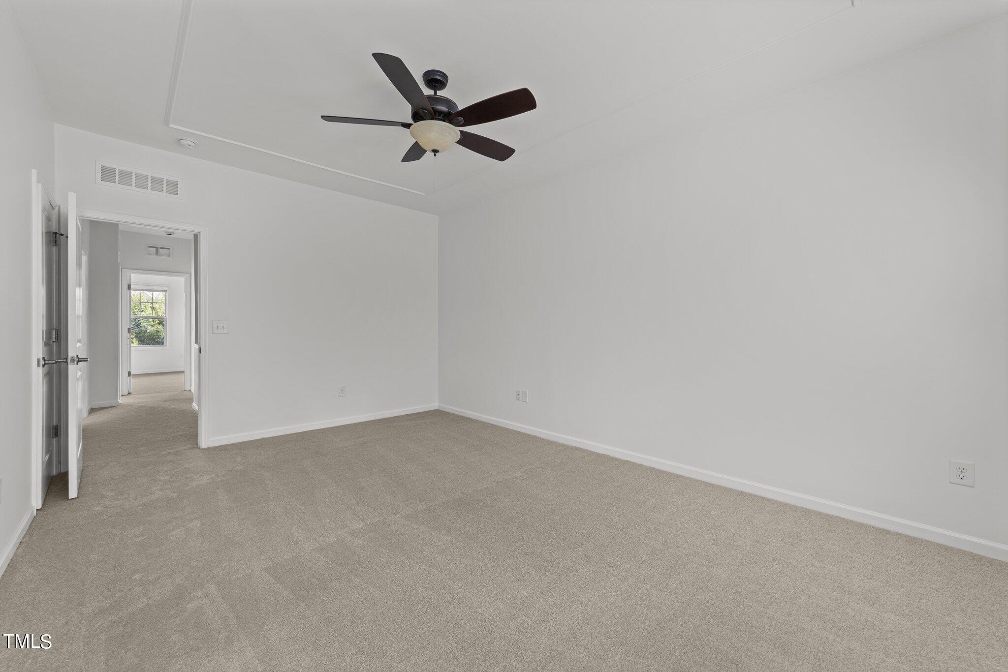 5627 Wade Park Boulevard Raleigh, NC 27607 - Photo 25 of 44 an empty room