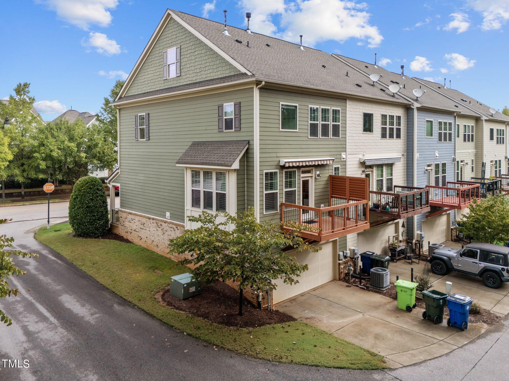 5627 Wade Park Boulevard Raleigh, NC 27607 - Photo 37 of 44 a front view of a house with garden