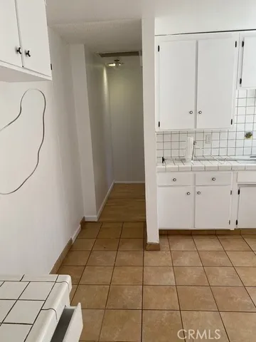 a bathroom with a sink a vanity and a mirror