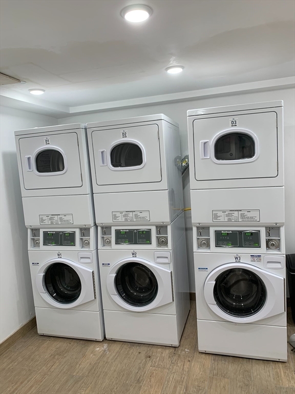 21 5th Street, Unit 1 Chelsea, MA 02150 - Photo 9 of 10 a utility room with dryer and washer