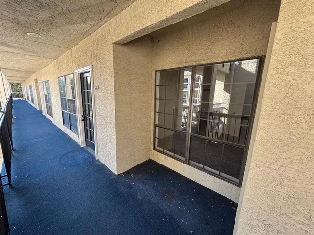 a view of gallery with wooden floor