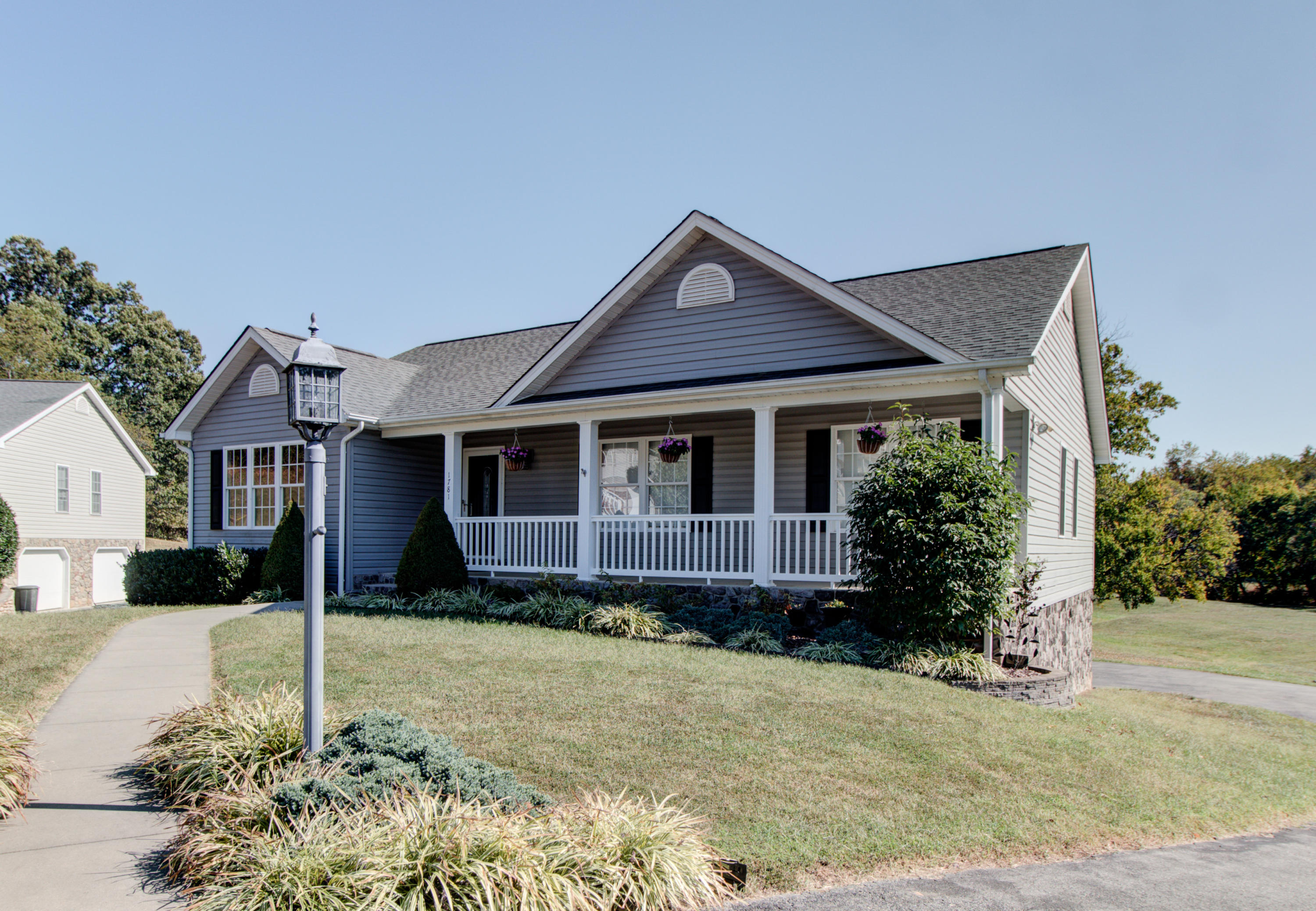 1781 Meadows Road Vinton, VA 24179 - Photo 2 of 26 a front view of a house with a garden