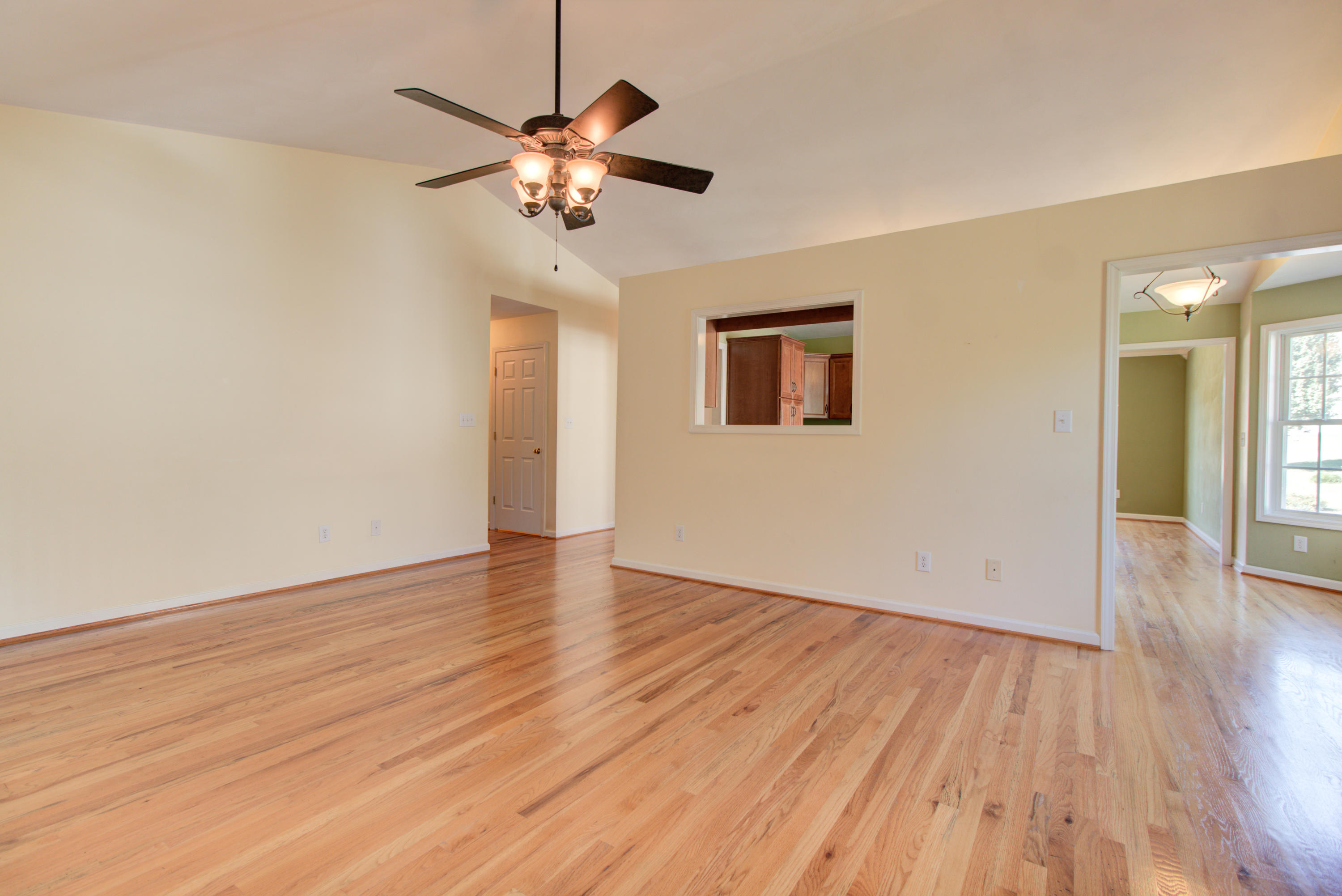 1781 Meadows Road Vinton, VA 24179 - Photo 11 of 26 a view of an empty room with wooden floor