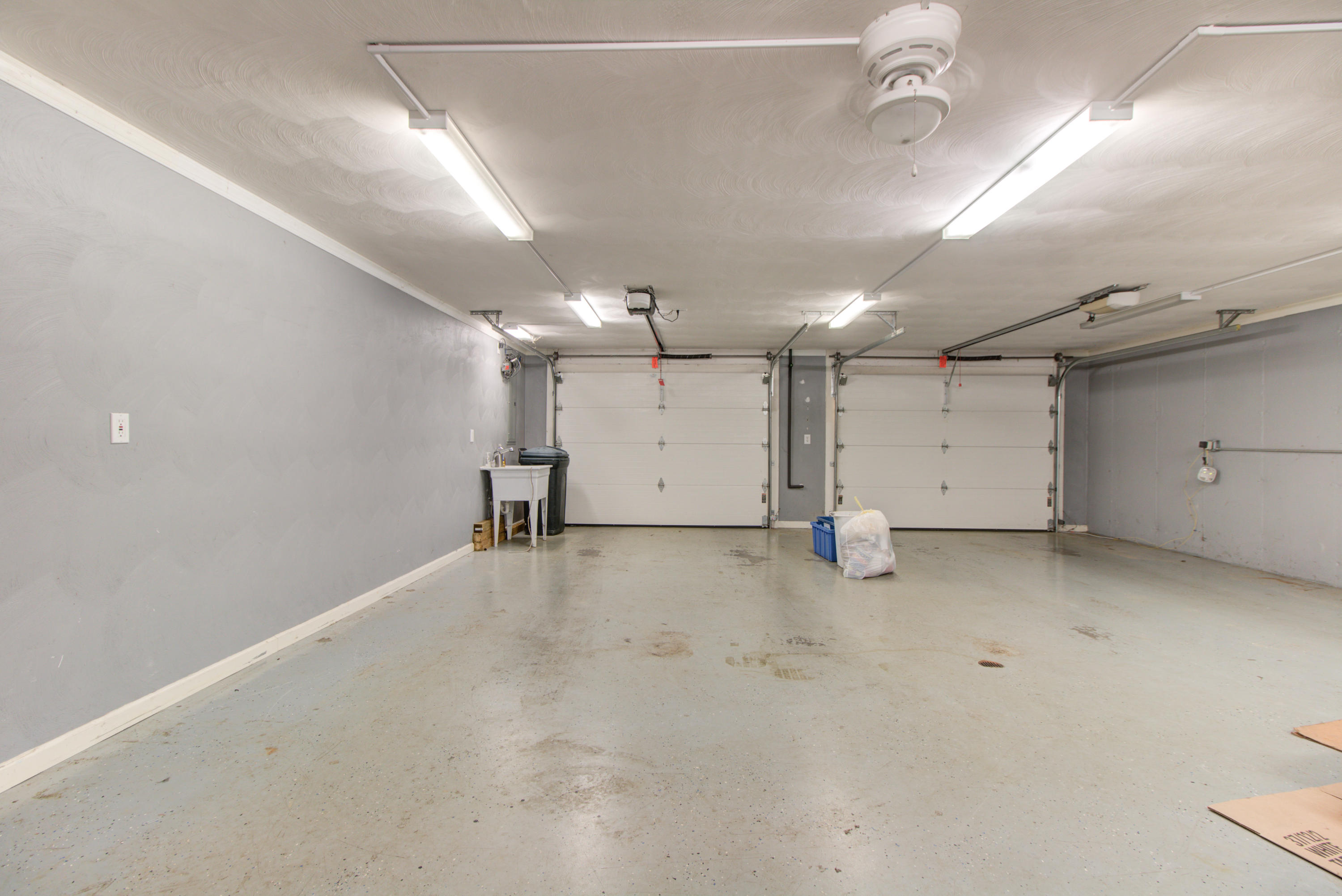 1781 Meadows Road Vinton, VA 24179 - Photo 22 of 26 an empty room with ceiling fan and windows