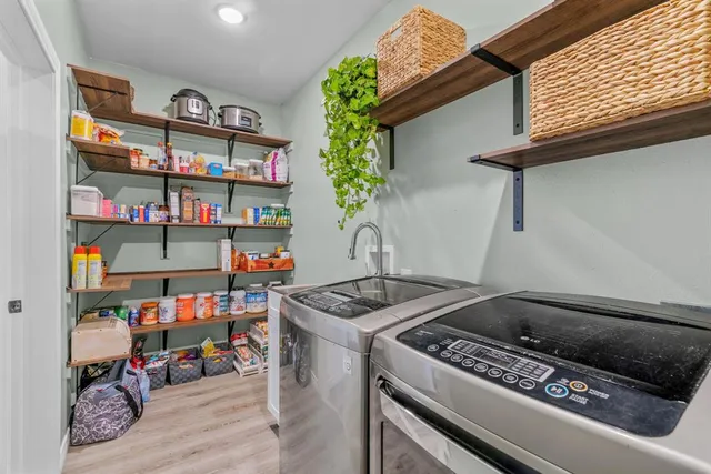 a room with furniture and a book shelf