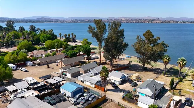 an aerial view of a houses with outdoor space