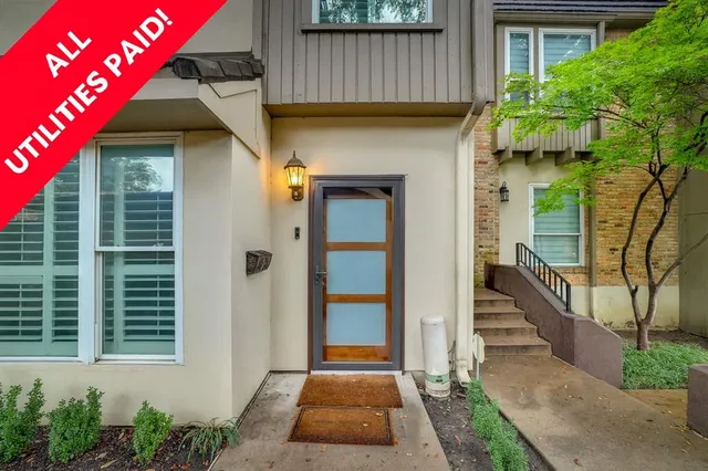 a front view of a house with a garage
