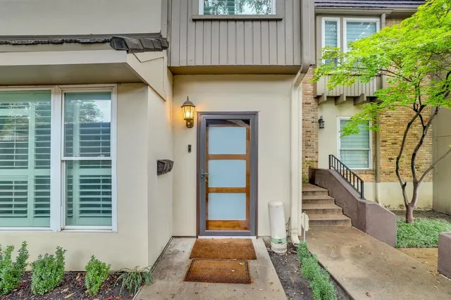 a front view of a house with a porch