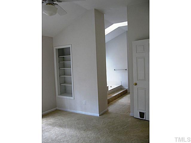 704 Manor Ridge Road Carrboro, NC 27510 - Photo 11 of 21 a view of an empty room with a white cabinet