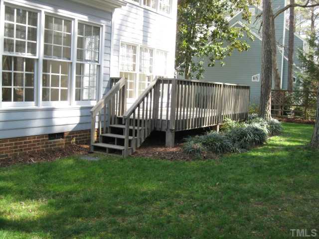 704 Manor Ridge Road Carrboro, NC 27510 - Photo 21 of 21 a view of a house with backyard and sitting area