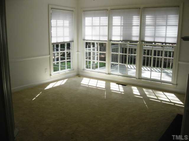 704 Manor Ridge Road Carrboro, NC 27510 - Photo 8 of 21 a view of an empty room with a window