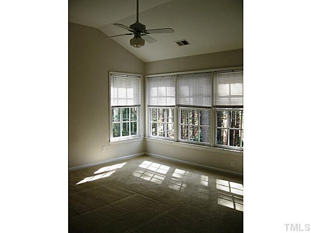 704 Manor Ridge Road Carrboro, NC 27510 - Photo 10 of 21 a view of an empty room with a window