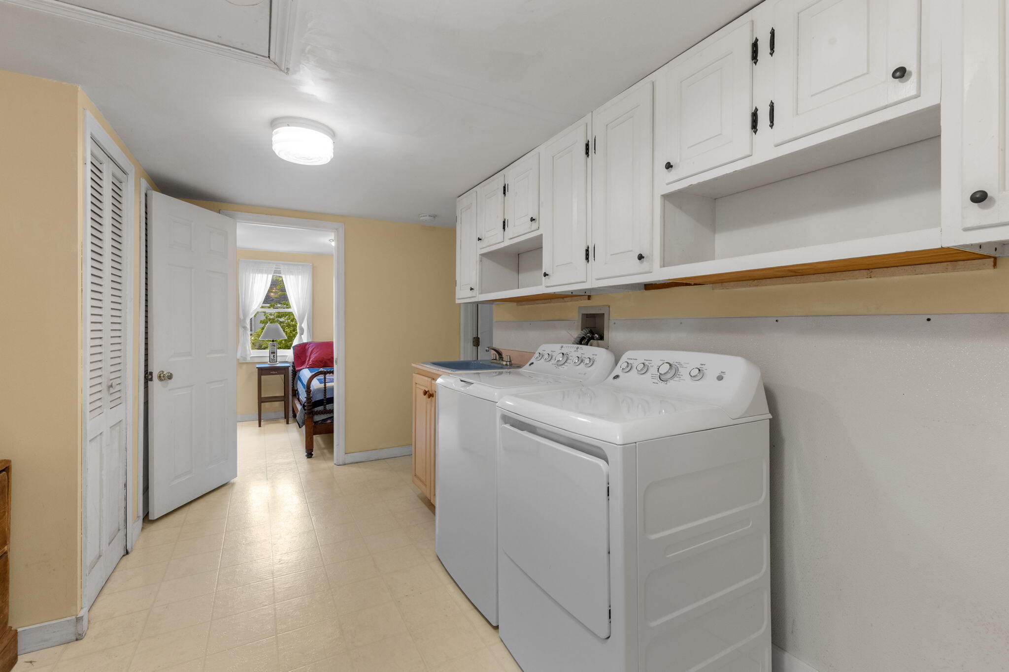 7 Aunt Matties Road Chatham, MA 02633 - Photo 17 of 37 a utility room with dryer and washer