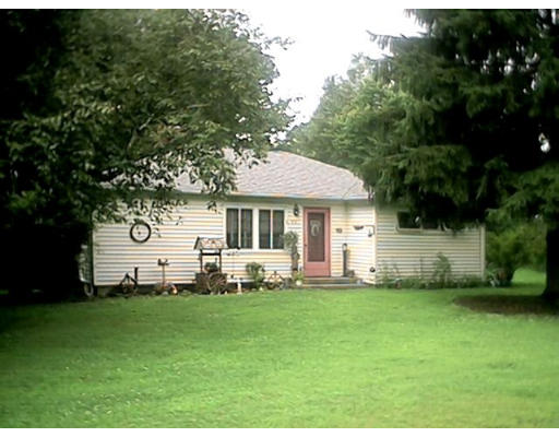 851 Florence Road Northampton, MA 01062 - Photo 1 of 1 a front view of a house with garden
