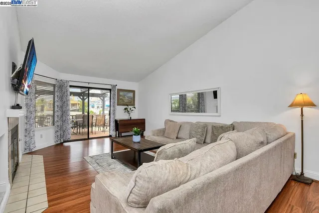 a kitchen with stainless steel appliances granite countertop a refrigerator stove and sink