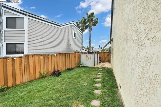 a dining space with furniture and outdoor view