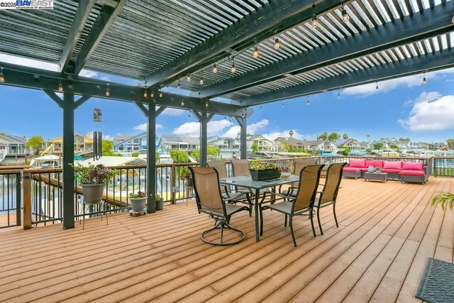 a view of a swimming pool with seating area
